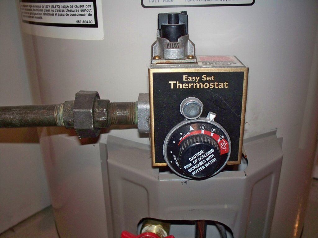 lower water heater temperature safely