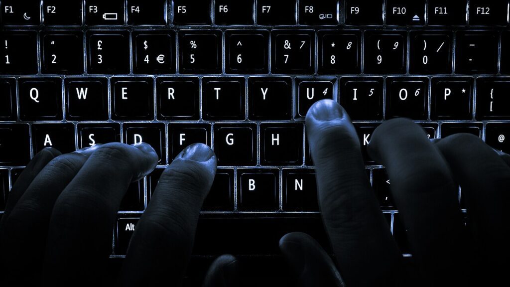 laptop on a desk during a safe cleanup routine
