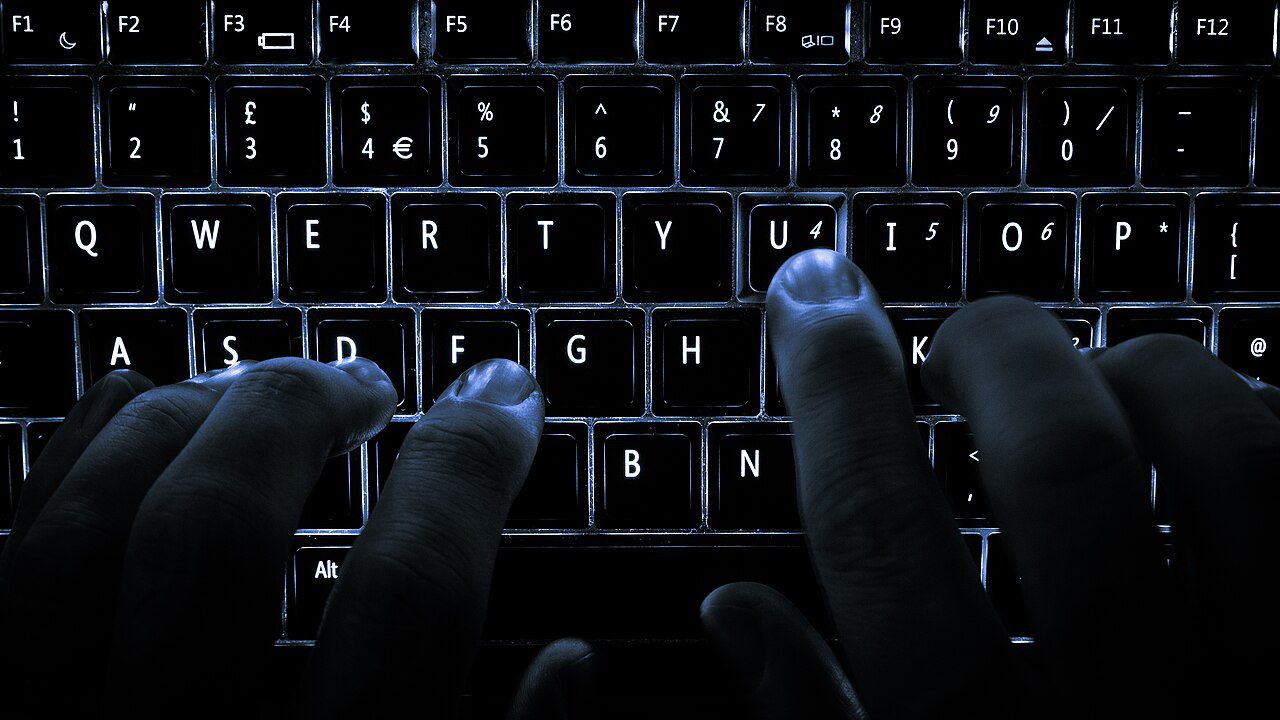 laptop on a desk during a safe cleanup routine