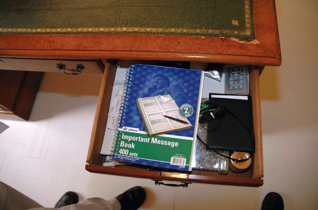 Organized cables and desk items used to illustrate desk cable cleanup tricks
