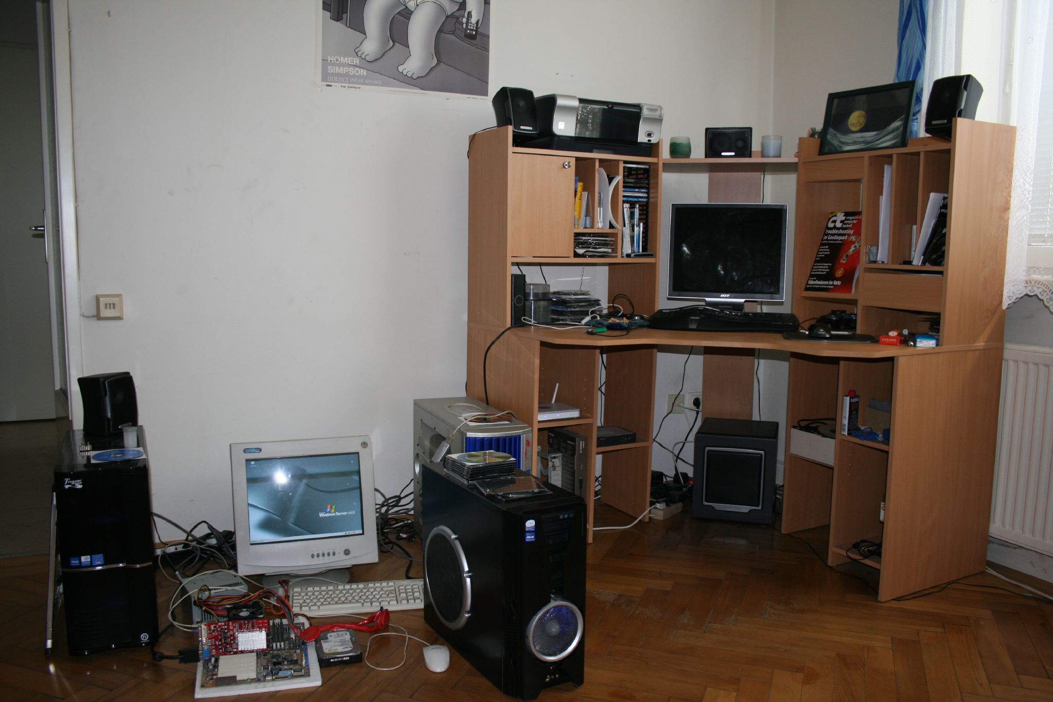 A cluttered computer desk used to illustrate Linux cleanup habits