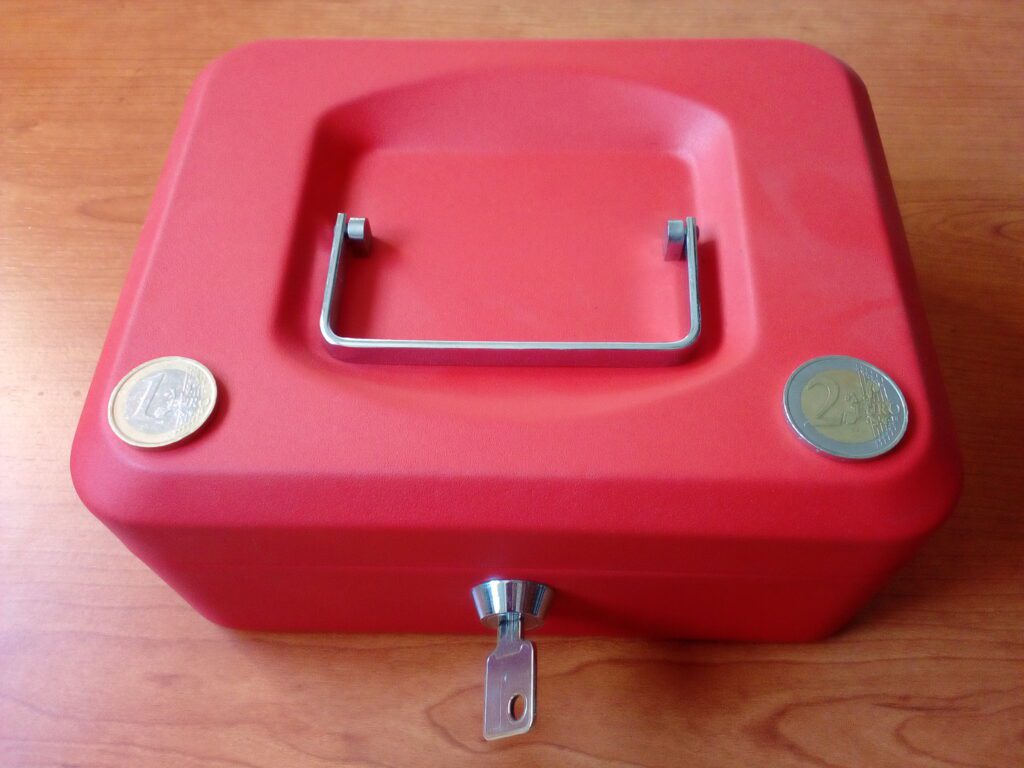 A small money box used to illustrate money-saving tech habits