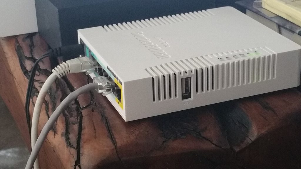 A home wireless router with antennas providing Wi-Fi and internet access